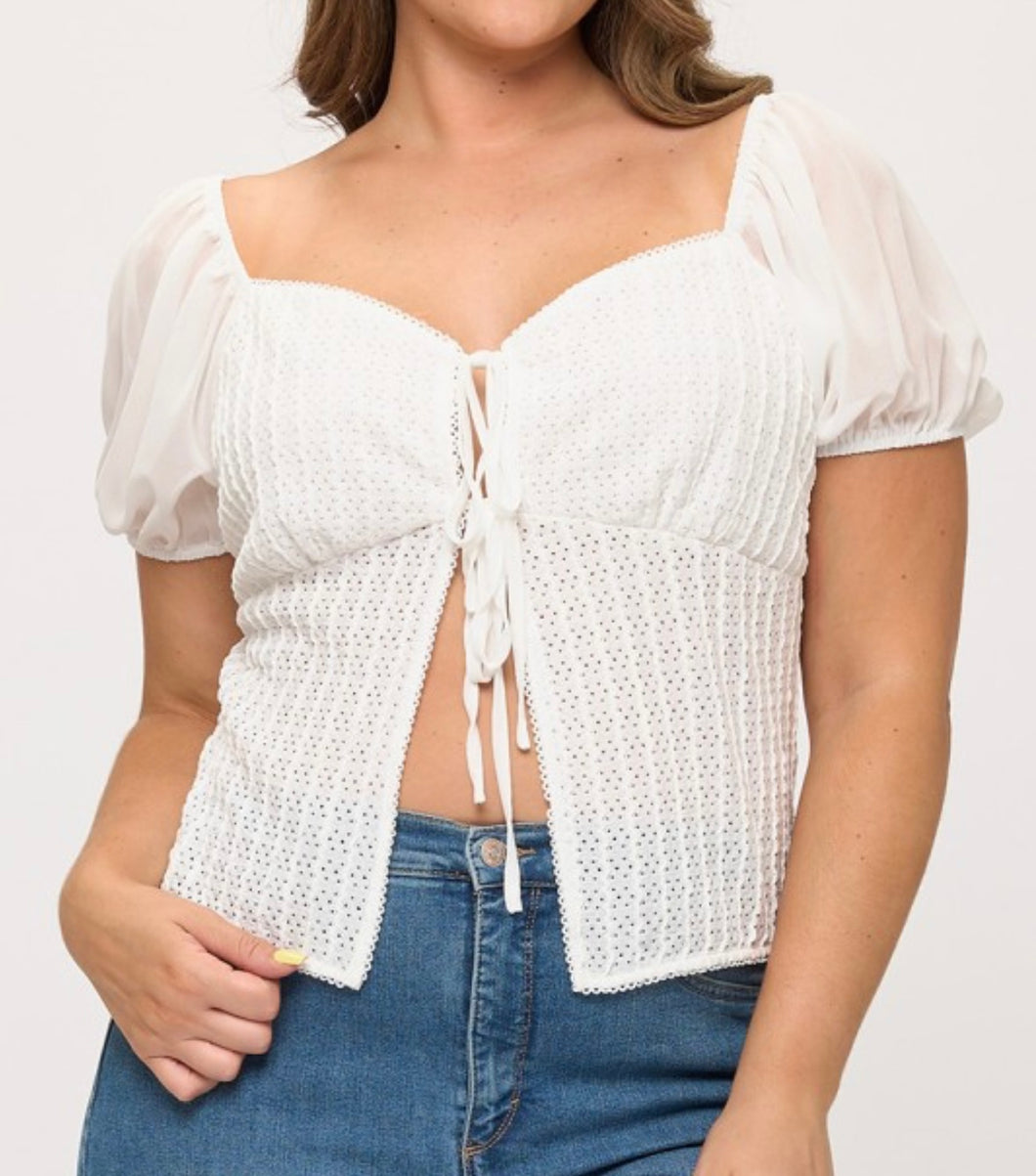 Solid front tie top